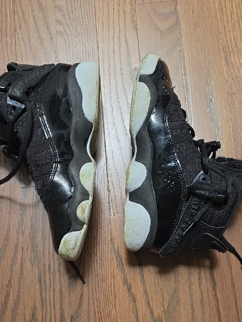 Jordan Black High-Top Patent Leather Sneakers